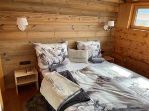 Postel nebo postele na pokoji v ubytování Penthouse Sonnenplatzl