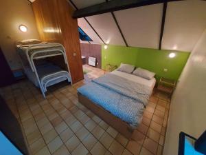Postel nebo postele na pokoji v ubytování Gîte du sanglier