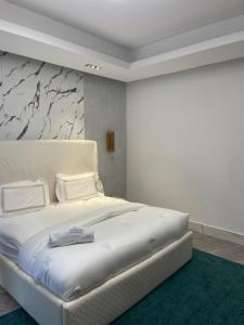 Katil atau katil-katil dalam bilik di Sujimoto Residences MacDonald