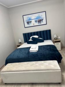 Postel nebo postele na pokoji v ubytování Komarom Luxe Apartment + 6 fotografií