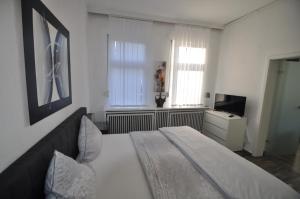 Ένα ή περισσότερα κρεβάτια σε δωμάτιο στο Feriendomizil Auszeit