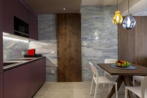 Kuchyň nebo kuchyňský kout v ubytování Calle Suite Lazise