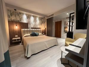 Posteľ alebo postele v izbe v ubytovaní Hotel Lo Zodiaco