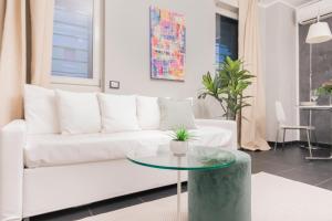 A seating area at Easylife - The Magnificent Flat Porta Venezia
