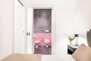 A bathroom at Easylife - The Magnificent Flat Porta Venezia Még 24 kép