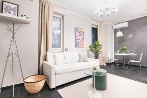 A seating area at Easylife - The Magnificent Flat Porta Venezia