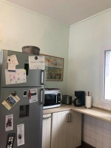 Una cocina o zona de cocina en Villa Triton - Vue mer