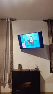 TV a/nebo společenská místnost v ubytování Appartement Rusp