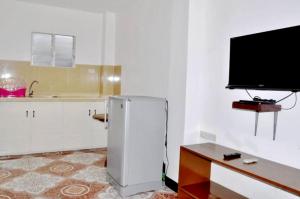 TV a/nebo společenská místnost v ubytování Nanette's Tourist Inn