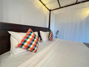 Letto o letti in una camera di Sunliya Resort