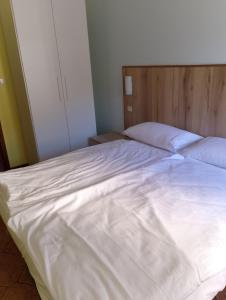 Postel nebo postele na pokoji v ubytování Hotel Garden