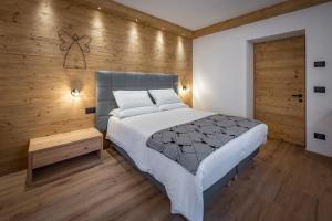 Postel nebo postele na pokoji v ubytování Il Cavallino - Albergo & Appartamenti