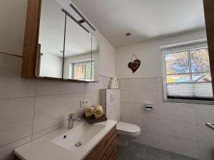 Kúpeľňa v ubytovaní Appartement Grubhof