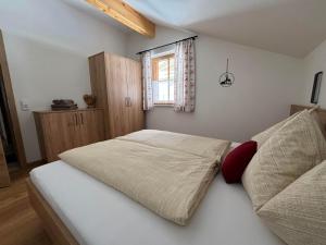 Posteľ alebo postele v izbe v ubytovaní Appartement Grubhof