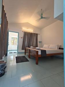 Letto o letti in una camera di Yog Hostel Varkala