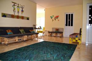 A seating area at MEETING POINT- Tarrafal Group Reservations