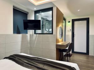 TV a/nebo společenská místnost v ubytování ON Hotel
