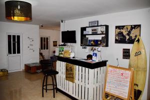 A television and/or entertainment centre at MEETING POINT- Tarrafal Group Reservations