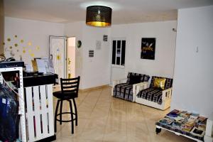 A seating area at MEETING POINT- Tarrafal Group Reservations