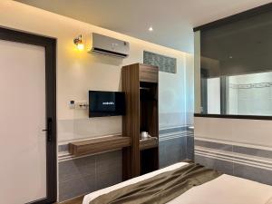 Postel nebo postele na pokoji v ubytování ON Hotel