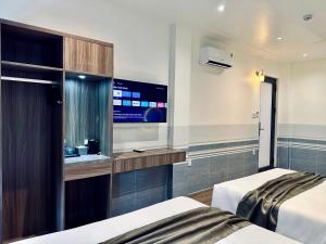 Postel nebo postele na pokoji v ubytování ON Hotel