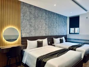 Postel nebo postele na pokoji v ubytování ON Hotel + 17 fotografií