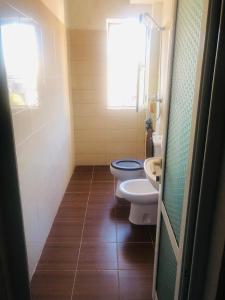 Koupelna v ubytování Sweet Cozzy Cottage