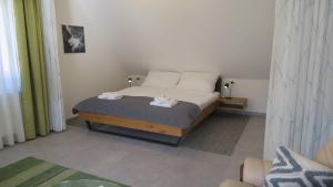 Posteľ alebo postele v izbe v ubytovaní Loft am Park