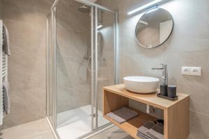 a bathroom with a sink and a shower at Apart Sonnenbichl in Sölden +16 photos