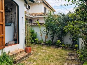 a garden in front of a house at Casa Piña in Villa de Leyva +14 photos