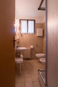 Koupelna v ubytování Hotel Ferrari