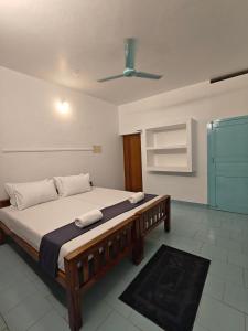Letto o letti in una camera di Yog Hostel Varkala
