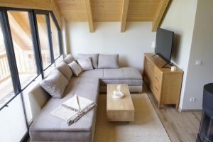 Posezení v ubytování Tiefenbach-Chalet