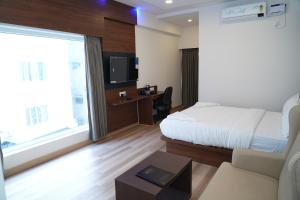 TV a/nebo společenská místnost v ubytování Hotel Grand Sigma