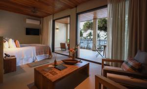 Cama ou camas em um quarto em Barracuda Boutique