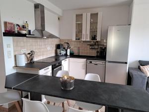 Kuchyň nebo kuchyňský kout v ubytování Cottage La Chaumière + 4 fotografie