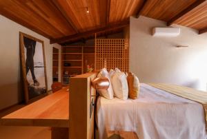 Cama ou camas em um quarto em Barracuda Boutique