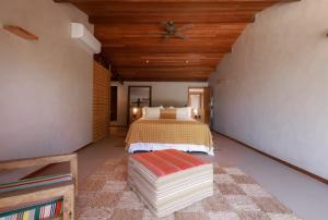 Cama ou camas em um quarto em Barracuda Boutique