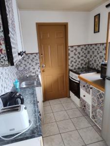 Kuchyň nebo kuchyňský kout v ubytování Temporada de verano Puerto Varas