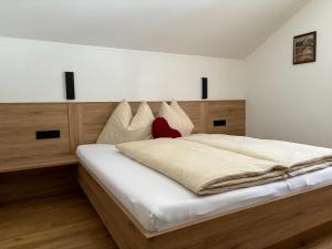 Posteľ alebo postele v izbe v ubytovaní Appartement Grubhof