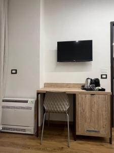 TV a/nebo společenská místnost v ubytování B&B La Quarantola
