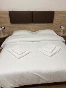 Postel nebo postele na pokoji v ubytování B&B La Quarantola