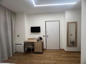 TV a/nebo společenská místnost v ubytování B&B La Quarantola