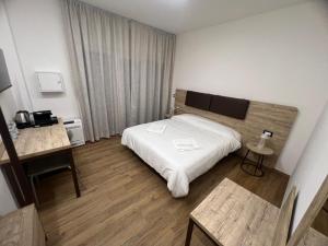 Postel nebo postele na pokoji v ubytování B&B La Quarantola