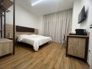 Postel nebo postele na pokoji v ubytování B&B La Quarantola