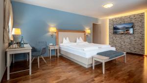 Voodi või voodid majutusasutuse Hotel der Wiesenhof toas
