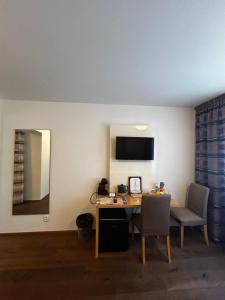 TV a/nebo společenská místnost v ubytování Aparthotel Tycho de Brahe