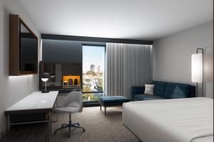 The Threefoot Hotel, Meridian, a Tribute Portfolio Hotel客房内的一张或多张床位