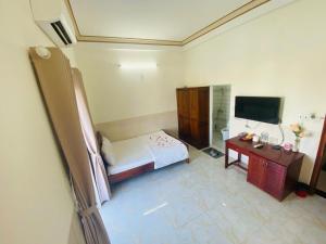 TV a/nebo společenská místnost v ubytování Magnolia Hotel Cam Ranh