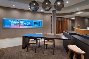 TV a/nebo společenská místnost v ubytování SpringHill Suites by Marriott Denver West/Golden